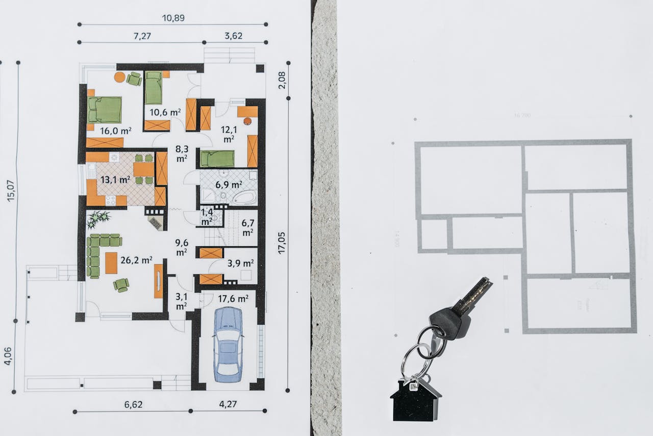 services-02 A comprehensive floor plan layout featuring a house key symbolizing real estate and homeownership.